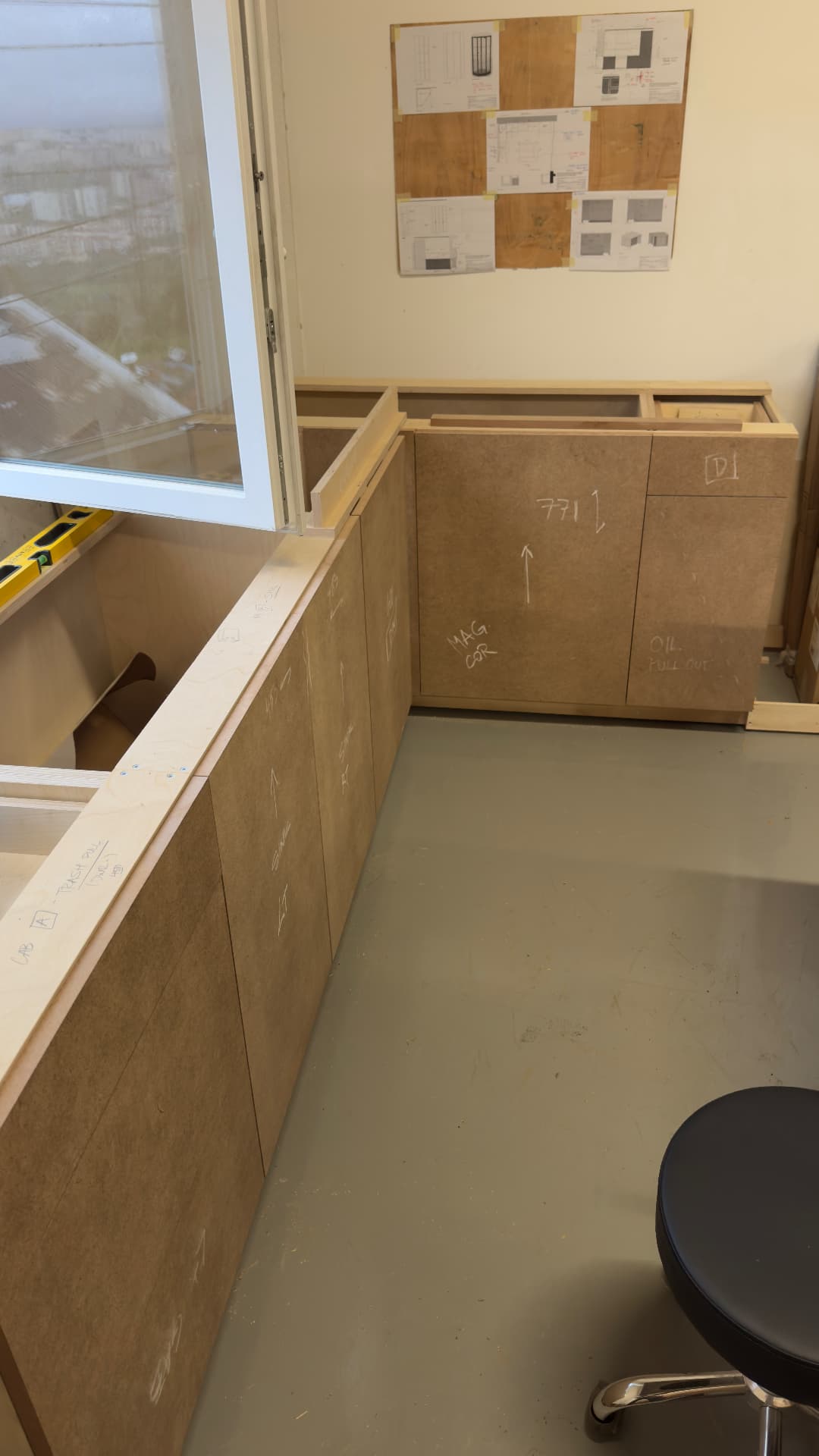 Kitchen cabinets scribed to the wall on site
