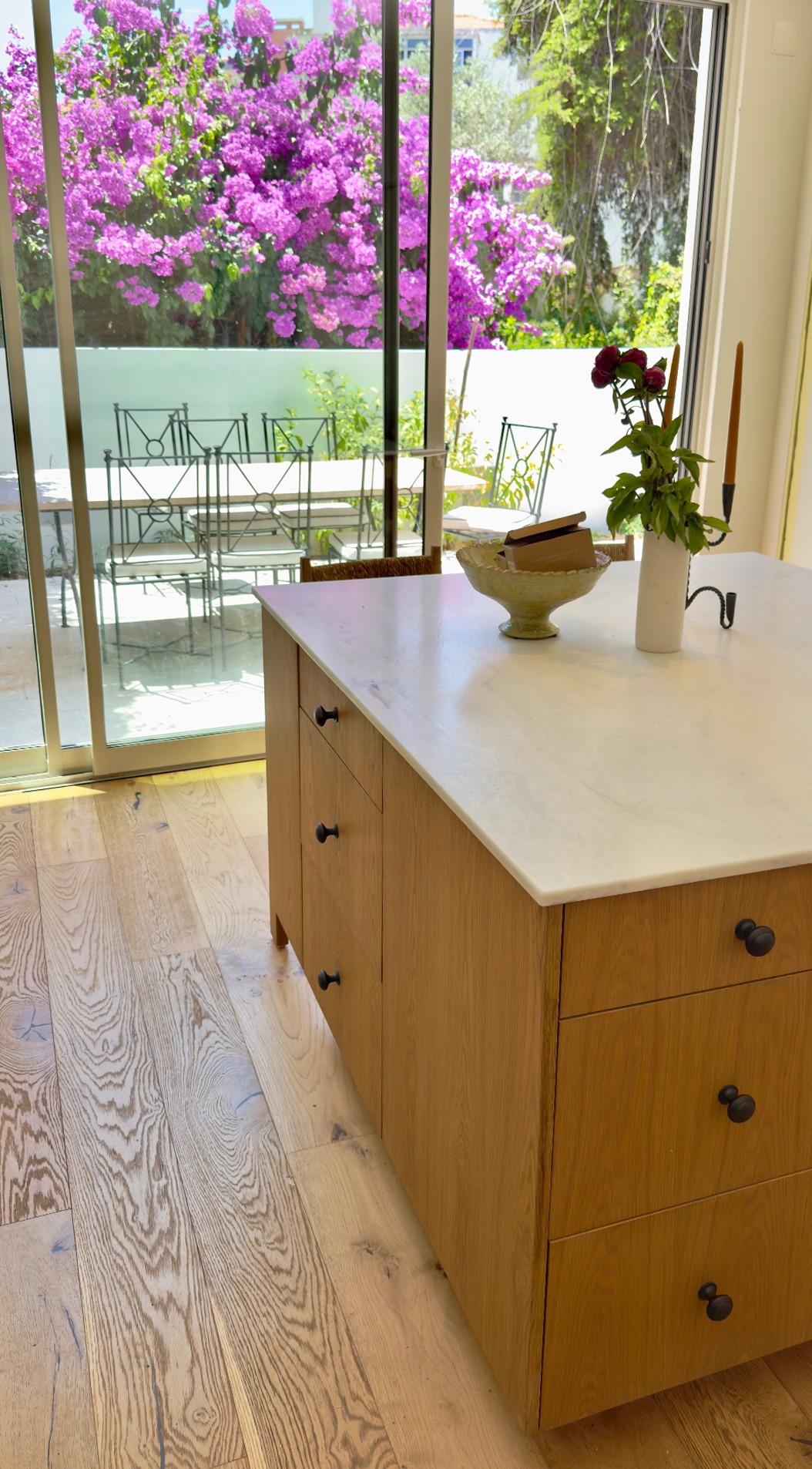 Oak island end with marble worktop and bronze knobs