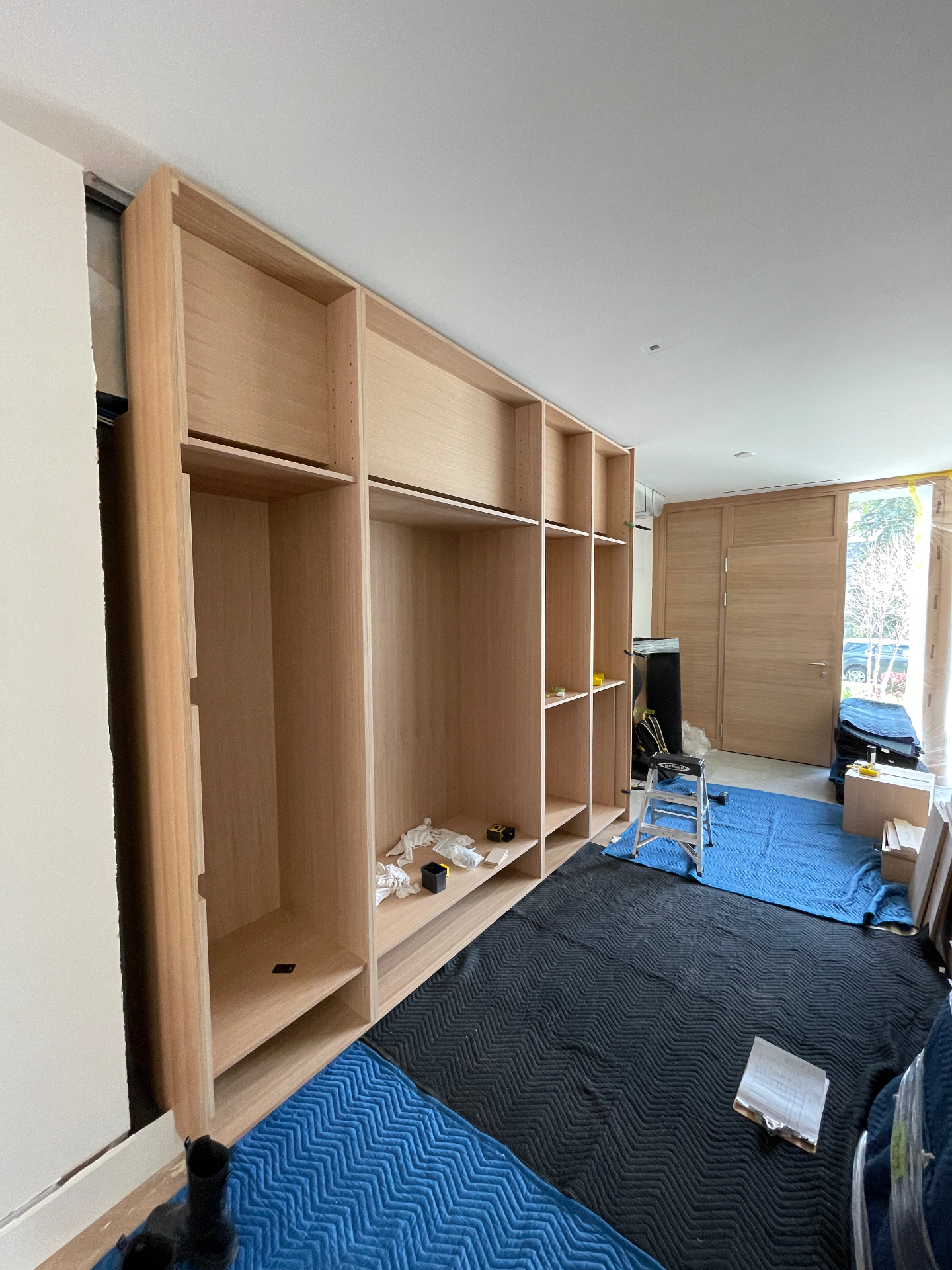 White oak carcasses installed on the entryway wall before doors go on