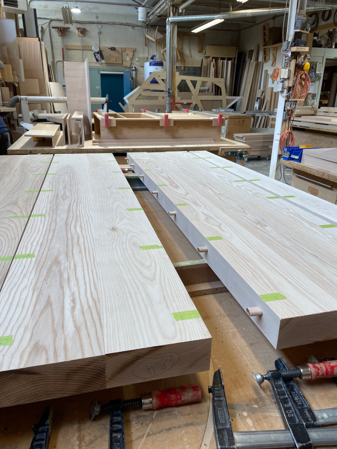 Ash boards doweled and laid out before glue-up