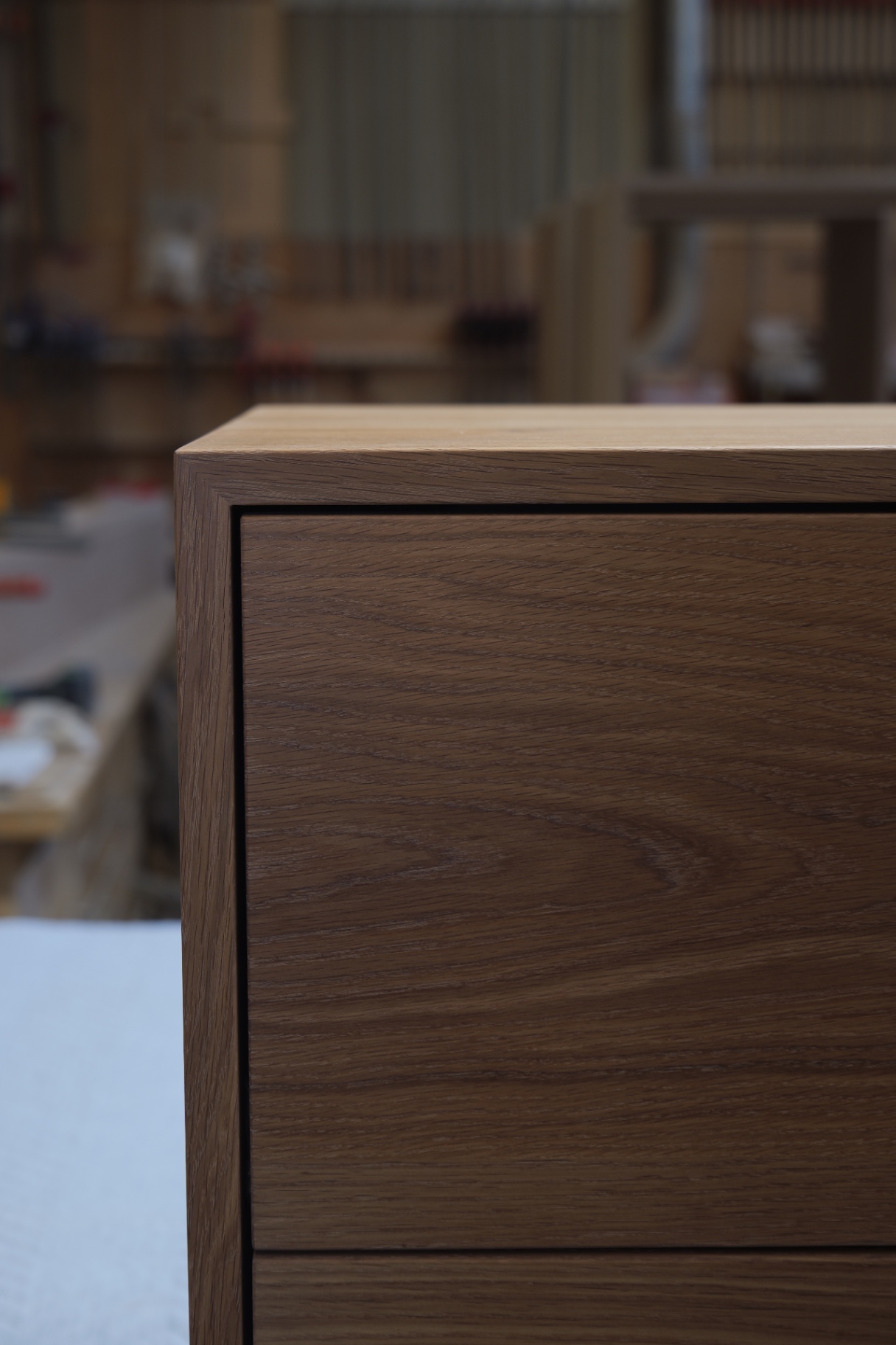 Close-up of mitred top corner and 2 mm shadow gap on the drawer front