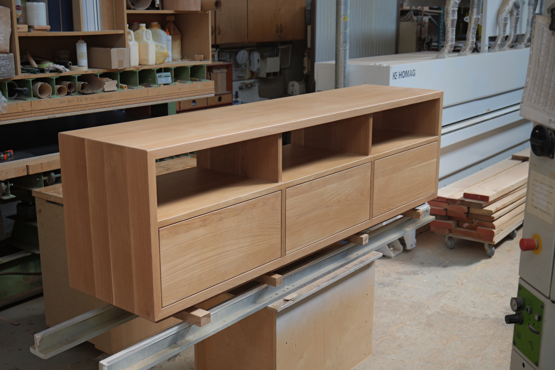Martin fitting a drawer front by hand in the Lisbon atelier