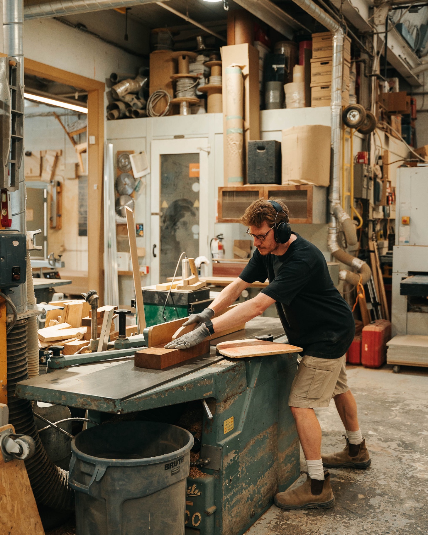 Martin shaping timber on a planer