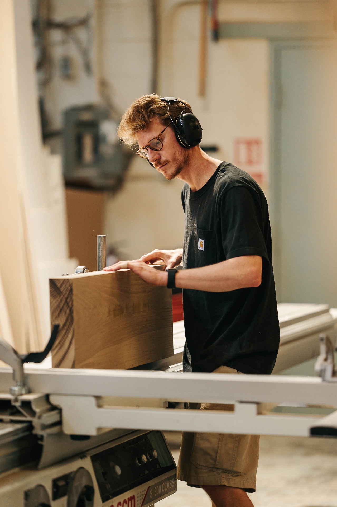 Martin shaping timber on a planer
