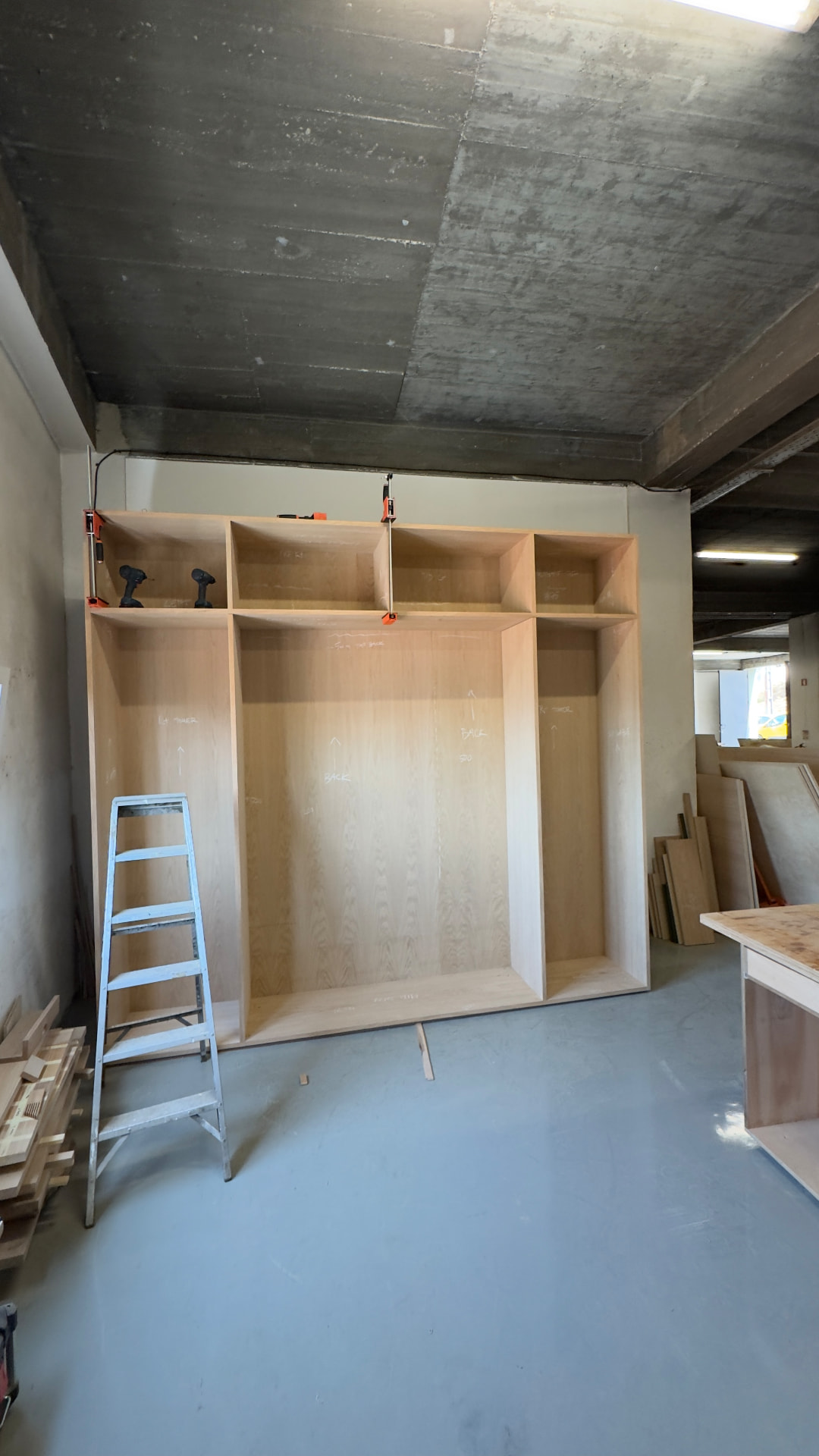 Full-height wardrobe carcasses clamped together
