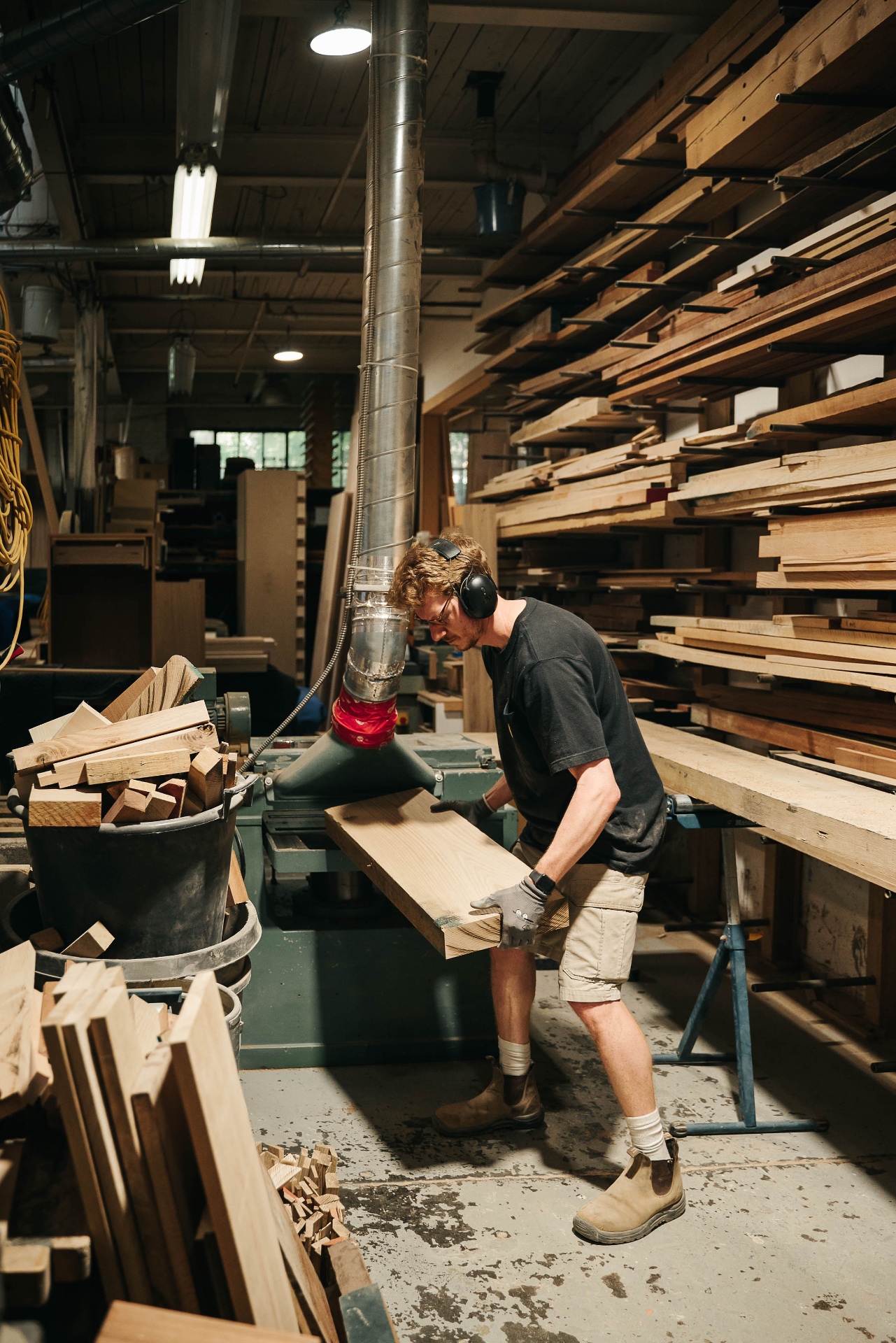Martin shaping timber on a planer
