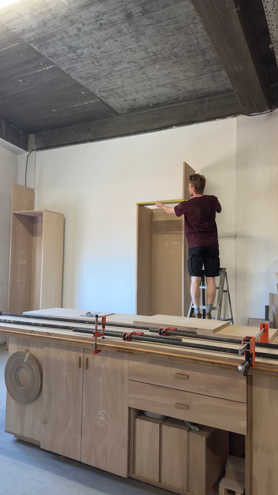 Measuring a wardrobe tower against the wall